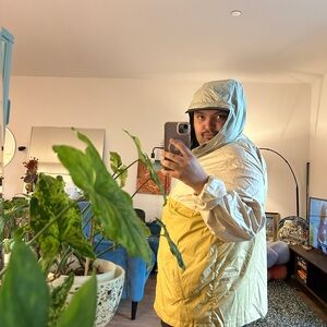 The North Face Windbreaker in Yellow & Cream